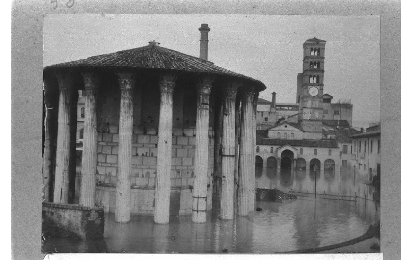 Round temple in the Forum Boarium (Rome, Italy) with S. Maria in Cosmedin in background during the flood
BSR Ashby Collection (TA[PHP]-I.050)